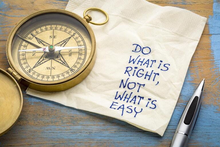 Do what is right, not what is easy advice or reminders - handwriting on napkins with antique brass compass Do what is right, not what is easy advice or reminders - handwriting on napkins with antique brass compass