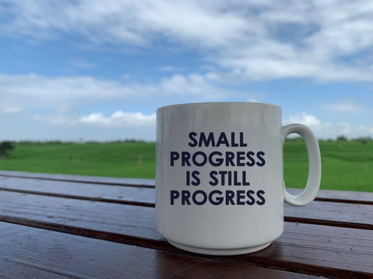 Coffee mugs printed small progress is still progress.